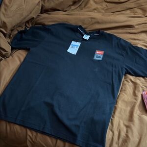 Nike Men's Black Short Sleeve Tee with Red Logo